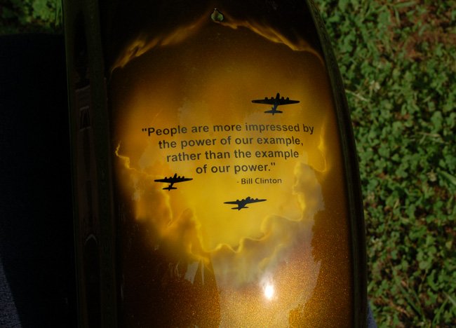Quote from Bill Clinton airbrushed on custom painted Army green candy paint.