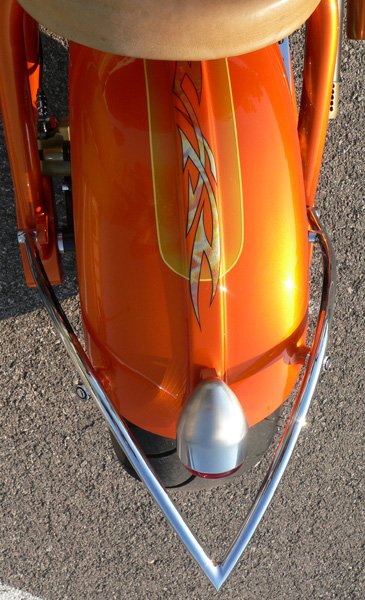 Basecolor is Orange Pearl Candy with gold leaf graphics.