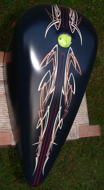 Black with freehand striping under the flat finish clear.