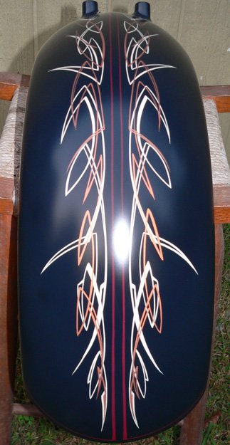 The freehand pinstripes are clearcoated with a flat finish clear.